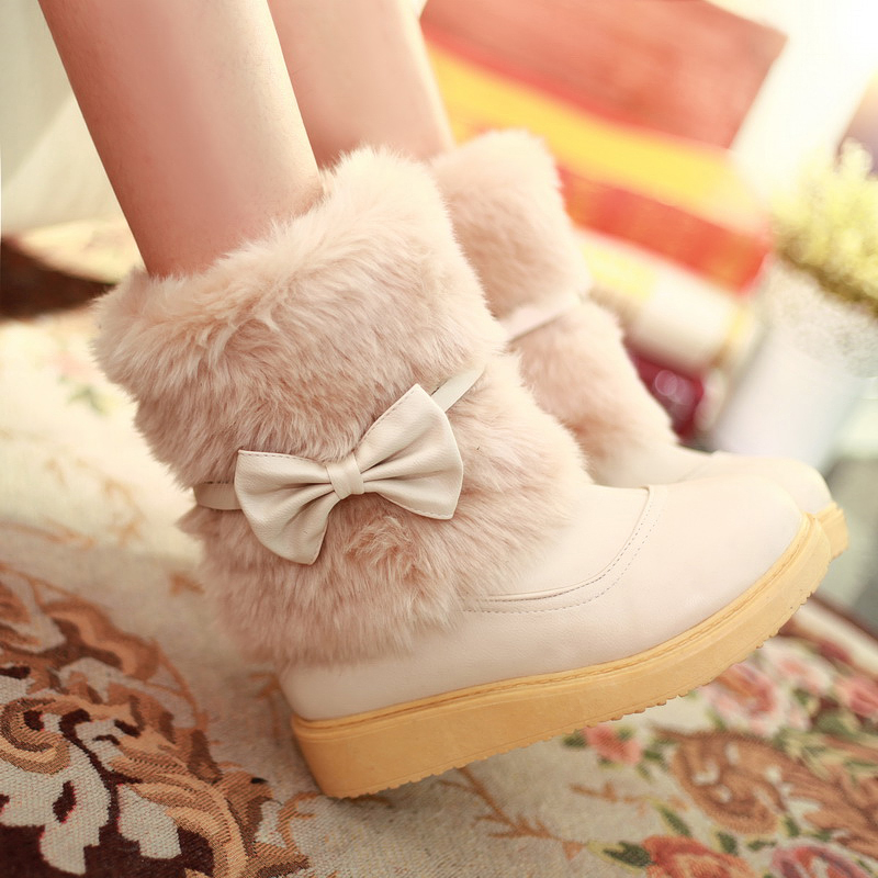 雪地靴平跟女靴圆头...