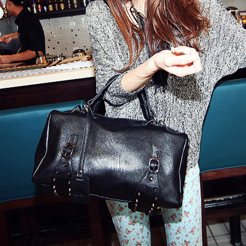 韩版简约铆钉圆桶...