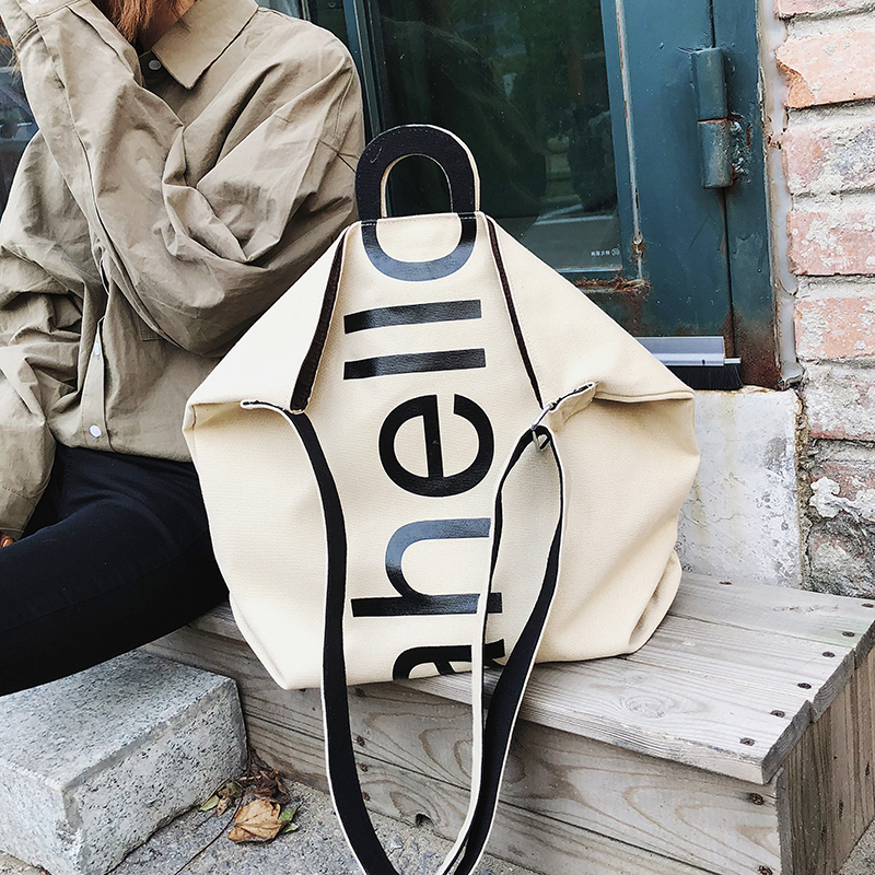 新款大包2019韩版潮时尚字母水桶包个性学院风帆布手提单肩挎包女在类目 玩具/童车/益智/积木/模型, 儿童包/背包/箱包, 斜挎包/拎包/腰包中 - 来自Buy2taobao.com提供专业的淘宝代购服务