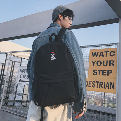 帆布男生双肩包潮流韩版初高中大学生书包时尚休闲青年旅行背包