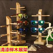 高档清漆实木眼镜展示架木质，太阳镜陈列支架原木，墨镜近视眼睛道具