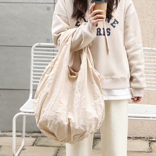 韩版褶皱尼龙布托特(布托特)包女大容量单肩布袋，慵懒风百搭手提饺子包