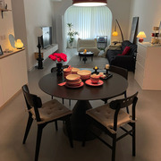 纯黑岩板圆桌小户型家用简约圆形餐桌，个性复古设计师圆桌饭桌