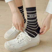 韩国袜子春秋款女条纹字母长筒小腿堆堆袜潮薄棉百搭黑白色中筒袜