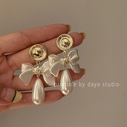 925银针蝴蝶结珍珠水滴耳环法式气质小众设计耳坠网红高级感耳饰
