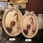 欧式摆台相框简约金属椭圆3寸6寸7寸珍珠组合创意儿童婚纱照片框