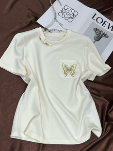 深圳南油2024夏季女装重工金线蝴蝶口袋盘扣显贵短袖T恤白色小衫