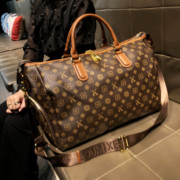 香港品牌旅行包大容量女2024春夏真皮手提大包短途男士行李包