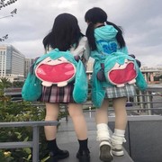 初音未来痛包miku猫耳朵收纳包少女卡通可爱双肩背包斜挎包学生包