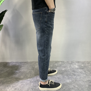 胡先生2023秋款男做旧高端牛仔裤灰蓝色微锥型修身显瘦小脚裤