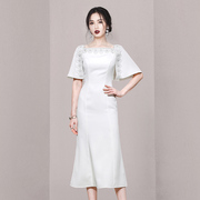 白色礼服连衣裙女性感蕾丝一字领鱼尾修身气质长裙子质感高级感夏