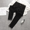 2022年夏季小脚裤口拉链设计欧美高街黑色破洞修身牛仔长裤男