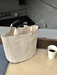 通勤方便帆布水桶包女补习装书手拎包装饭盒袋上班用ins手提布包