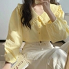 春秋奶黄色长袖衬衫女chic法式复古娃娃领上衣设计感小众奶甜衬衣