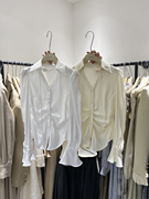 广州U.me2024法式V领系带衬衫女春季设计感别致长袖白色上衣