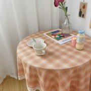 大千印象韩国ins同款复古暖橘色格纹桌布，野餐布餐垫摆拍背景沙发