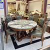 欧式新中乌金实木餐桌奢华大理石，真皮餐椅1.5米圆形餐台雕刻组合
