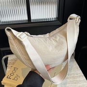 多巴胺日系斜跨包女包2025新款出游通勤轻便百搭饺子包单肩小挎包