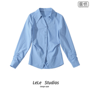 蓝色衬衫女袖口褶皱，收腰显瘦设计感长袖上衣尖领内搭衬衣