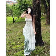 夏季2024白色蕾丝吊带连衣裙女仙气设计感不规则斜摆收腰长裙