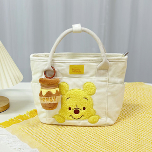 迪士尼正版维尼熊蜜蜂罐，挂件手铃包可爱手提斜挎包两用大容量书包