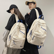 帆布书包女高中大学生背包2022小众设计质感大容量双肩包男潮
