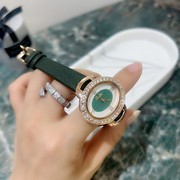 表带士镶钻椭圆形个性手表，简约气质女时尚石英真皮普通国产腕表