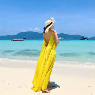 女三亚度假连衣裙沙滩吊带黄色长裙海边露背夏季超仙旅行旅游大码
