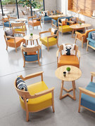 奶茶店咖啡厅接待区休闲实木，双人沙发甜品，店书吧洽谈桌椅茶几组合