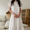 法式温柔白色连衣裙女夏季甜美风花型镂空花瓣，袖宽松休闲纯色长裙