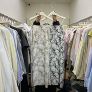 春季韩版设计感潮流韩国东大门显白度假风气质印花吊带连衣裙