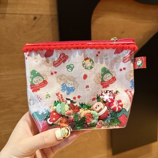 可爱卡通圣诞节礼物pvc透明流沙手拿包化妆包，零钱耳机口红收纳包