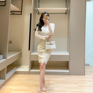 白色水溶蕾丝连衣裙高级感2023秋季轻奢性感女人味长袖包臀裙
