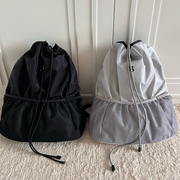 原创设计包包女尼龙双肩包运动(包运动)休闲抽绳袋书包，背包大容量单肩包男