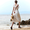 白色斜肩海边沙滩裙腰部镂空收腰度假连衣裙高级感平时可穿小礼服