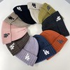 韩国进口秋冬字母保暖羊毛混纺护耳毛线帽针织帽子女包头
