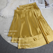 2024三醋酸姜黄色(姜黄色，)半身裙女短中长裙，a字金黄缎面气质高贵优雅