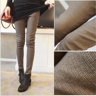 我新买了一件<em>黑色</em>中长上衣,想求购一条<em>格子</em>裤