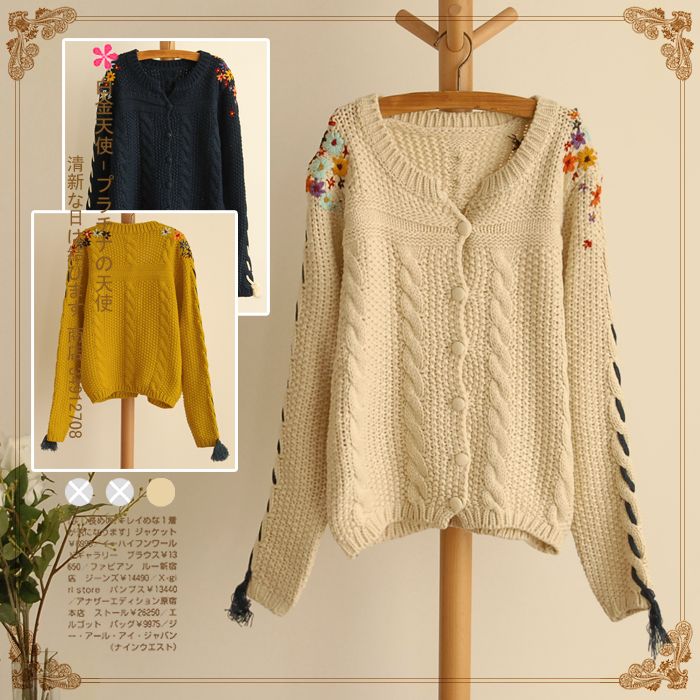 彩花圆领针织毛衣...