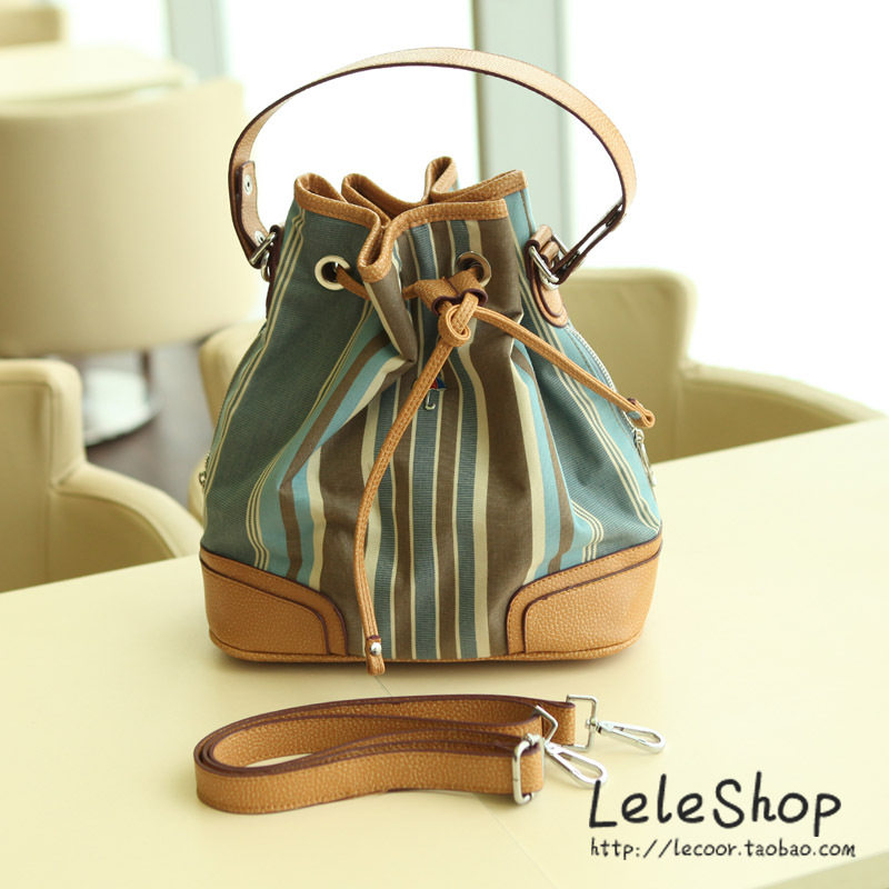 美丽说推荐 Leleshop 2012新款小雨伞 高级防水休闲 圆桶包手提包