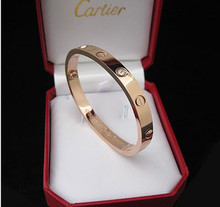Cartier Cartier amor pulsera de titanio de acero en oro rosa con un destornillador de estrella brazalete de diamantes