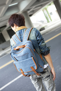  新款韩版铆钉男式双肩包 潮流休闲旅行包学生书包