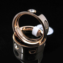 Versión de la parte superior de la clásica serie de anillo de diamantes de Cartier Cartier AMOR de 18 tarjetas se elevó unos anillos de oro