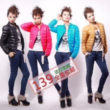 淘宝网2件包邮2012新款春装机车薄款立领羽绒服女短款正品清仓外套送裤