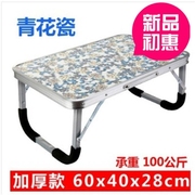 床上放床上用的小桌子，放在可折叠写字桌老人，病人床上吃饭桌