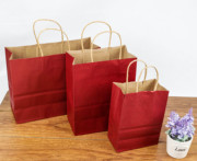 深红纸袋子服装店牛皮纸袋，衣服购物手拎袋印店名logo
